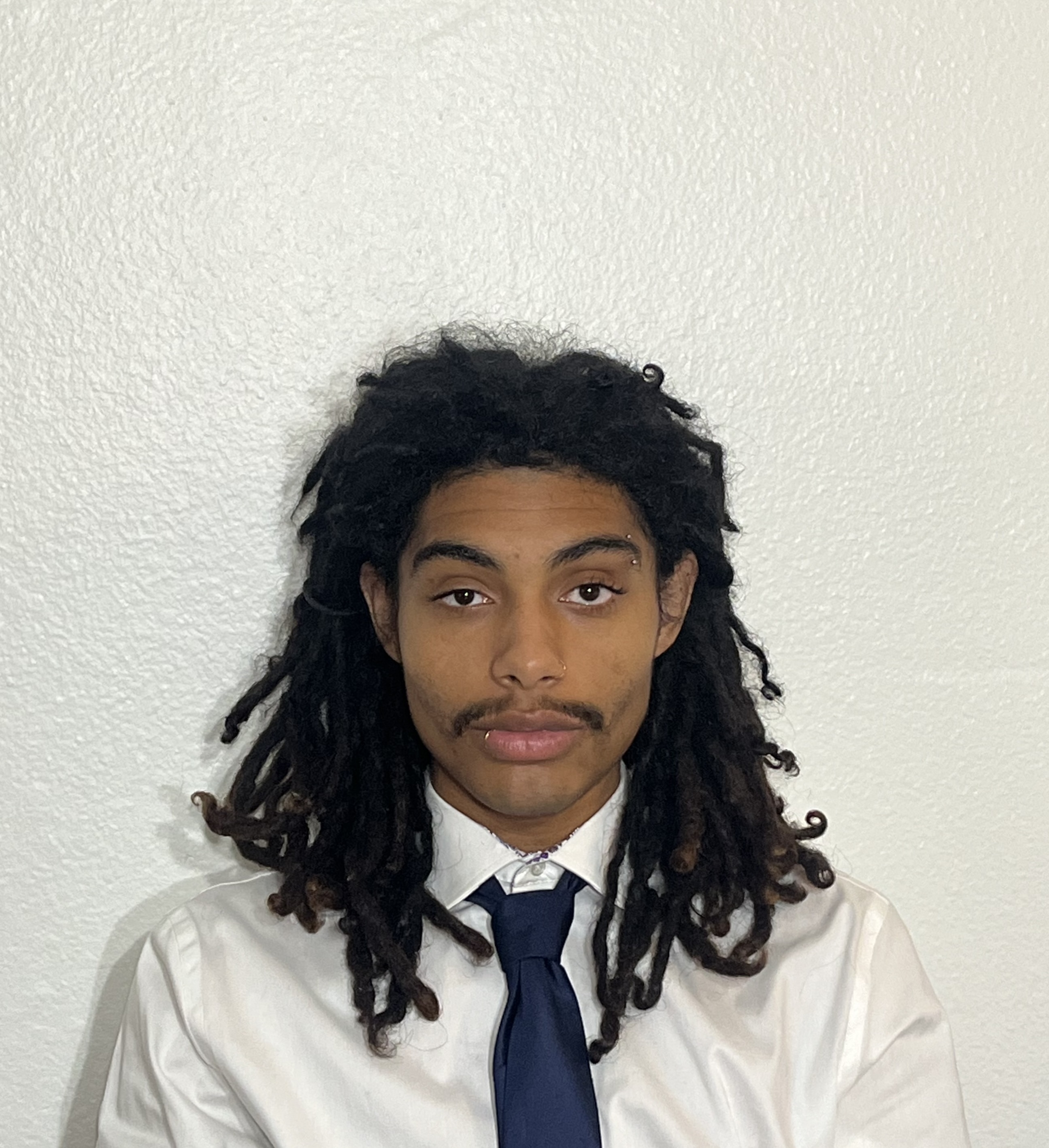 Christopher Buchanan - Vimarsana News